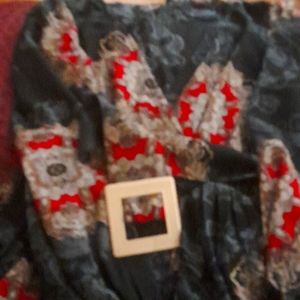 A Maxi dress with a leather belt that goes with the dress